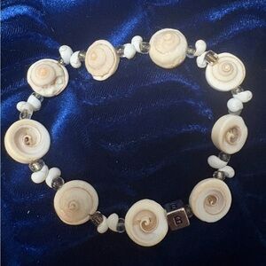 Very Pretty Delicate White Shell Stretch Bracelet. Measures 9inches unstretched.